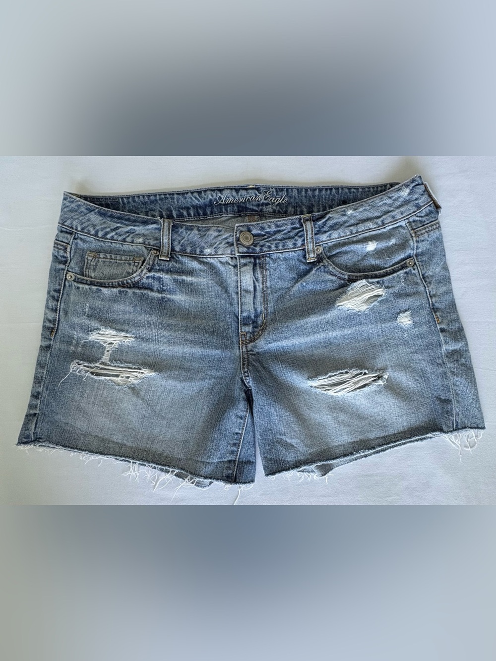 American Eagle Distressed Denim Shorts Size 14 Light Wash Raw Hem